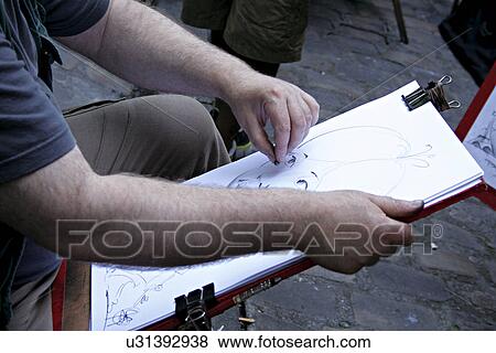 Stock Photo - Man sketching. Fotosearch