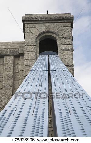 Stock Photograph - Metal ramp to tower window. Fotosearch