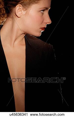 Stock Image - Profile of young woman. Fotosearch