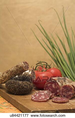 Sausage and tomatoes View Large Photo Image Stock Photo - Sausage and tomatoes. Fotosearch
