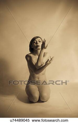 Stock Photography - Sepia tone topless woman. Fotosearch