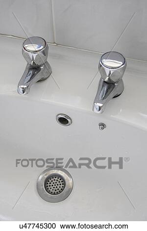 Stock Image - Sink and faucet. Fotosearch