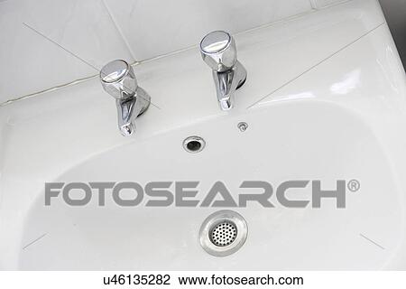 Stock Image - Sink faucet. Fotosearch