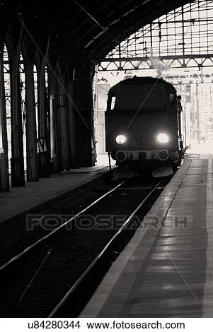 Picture - Train entering station. Fotosearch