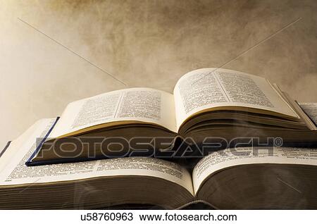 Two open books, stacked View Large Photo Image Stock Image - Two open books, stacked. Fotosearch