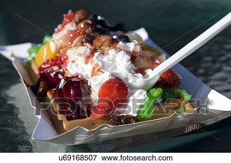 Waffle topped with fruit and whipped cream View Large Photo Image Stock Photo - Waffle topped with fruit and whipped cream. Fotosearch