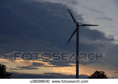 Stock Image - Windmill at dusk. Fotosearch