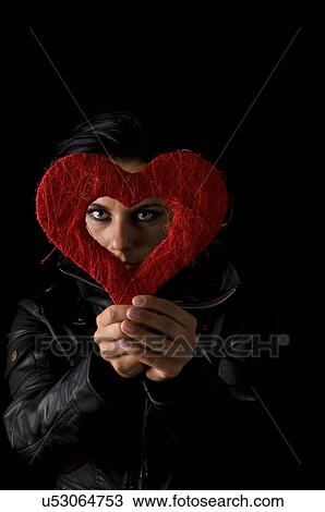 Woman holding red heart View Large Photo Image Stock Image - Woman holding red heart. Fotosearch