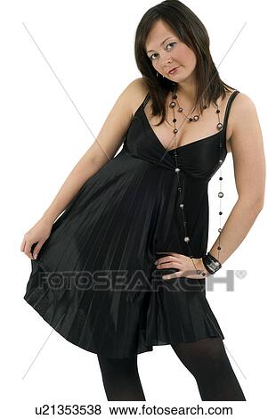 Woman in black dress View Large Photo Image Stock Photo - Woman in black dress. Fotosearch