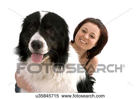 Woman petting sheepdog View Large Photo Image Stock Photography - Woman petting sheepdog. Fotosearch
