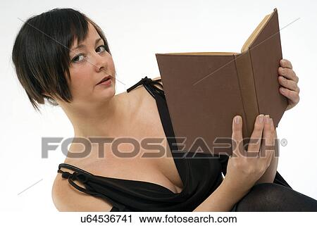 Stock Image - Woman reading a book. Fotosearch