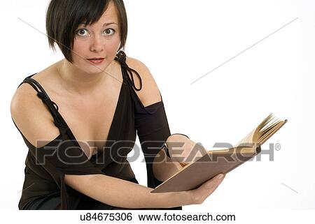 Woman reading a book View Large Photo Image Stock Photograph - Woman reading a book. Fotosearch