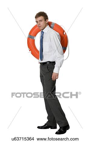 Picture - Young man holding a life ring. Fotosearch