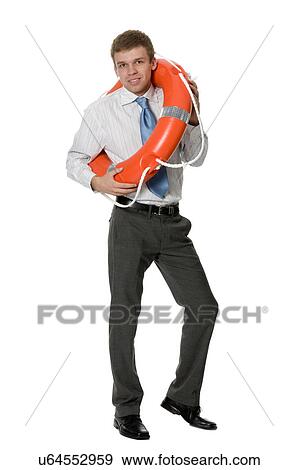 Young man wearing a life ring View Large Photo Image Stock Photo - Young man wearing a life ring. Fotosearch