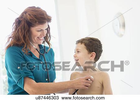 boy (6-7) undergoing medical exam View Large Photo Image Stock Image - boy (6-7) undergoing medical exam. Fotosearch