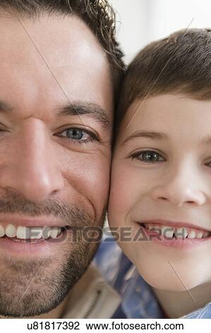 Close-up of happy father and son (8-9) View Large Photo Image Stock Image - Close-up of happy father and son (8-9). Fotosearch