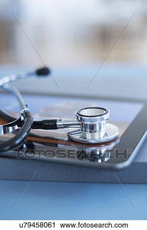Close up view of stetoscope on digital tablet View Large Photo Image Stock Image - Close up view of stetoscope on digital tablet. Fotosearch