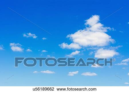 Clouds against blue sky View Large Photo Image Stock Image - Clouds against blue sky. Fotosearch