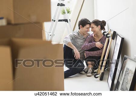 Couple in new home View Large Photo Image Stock Image - Couple in new home. Fotosearch