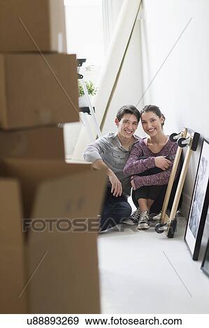 Couple in new home View Large Photo Image Stock Photo - Couple in new home. Fotosearch
