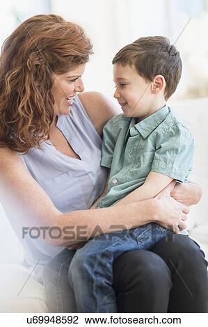 Stock Image - Mother and son (6-7). Fotosearch