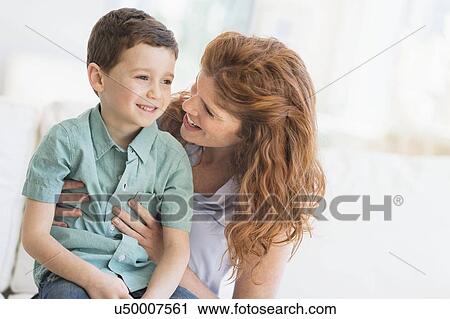 Mother embracing son (6-7) View Large Photo Image Stock Image - Mother embracing son (6-7). Fotosearch