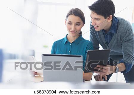 Picture - People working in office. Fotosearch