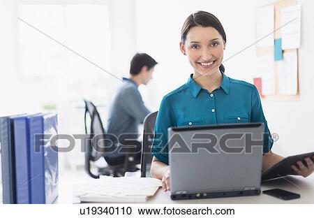 Stock Image - People working in office. Fotosearch