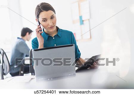 Stock Image - People working in office. Fotosearch