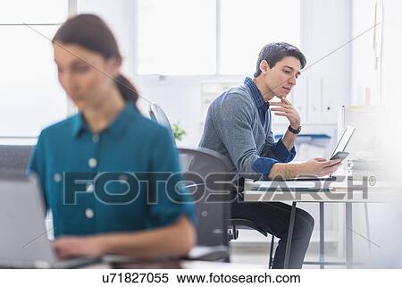 People working in office View Large Photo Image Stock Photography - People working in office. Fotosearch