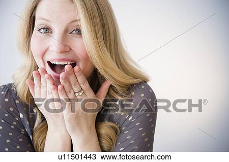 Portrait of blond woman smiling View Large Photo Image Stock Image - Portrait of blond woman smiling. Fotosearch