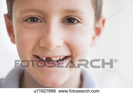 Portrait of boy (8-9) smiling View Large Photo Image Stock Photograph - Portrait of boy (8-9) smiling. Fotosearch