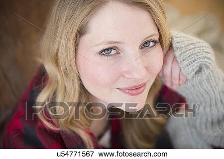 Stock Photo - Portrait of content woman. Fotosearch