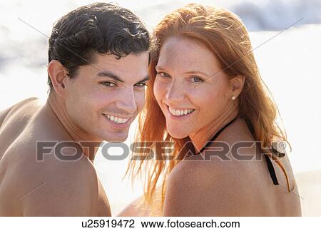 Portrait of couple on beach View Large Photo Image Stock Image - Portrait of couple on beach. Fotosearch