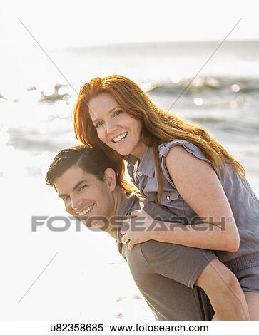 Portrait of couple on beach View Large Photo Image Stock Photography - Portrait of couple on beach. Fotosearch