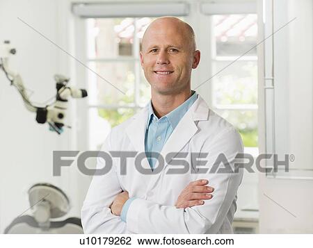 Stock Image - Portrait of dentist. Fotosearch