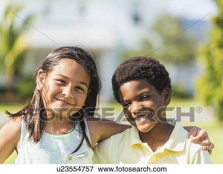Portrait of girl ( 8-9) and boy (6-7) View Large Photo Image Stock Photo - Portrait of girl ( 8-9) and boy (6-7). Fotosearch