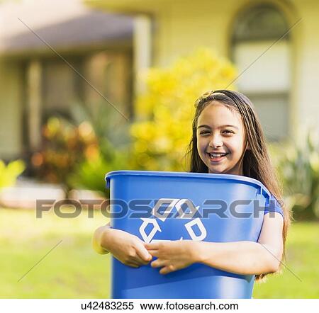 Portrait of girl ( 8-9) holding recycling bin View Large Photo Image Stock Photography - Portrait of girl ( 8-9) holding recycling bin. Fotosearch