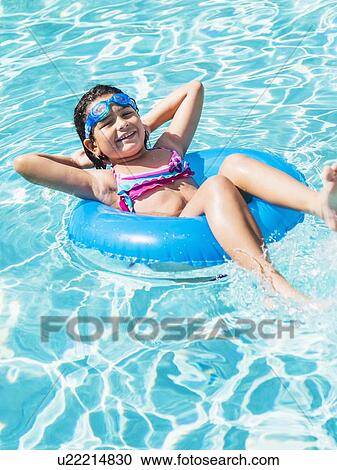 Portrait of girl ( 8-9) with inflatable ring View Large Photo Image Stock Image - Portrait of girl ( 8-9) with inflatable ring. Fotosearch