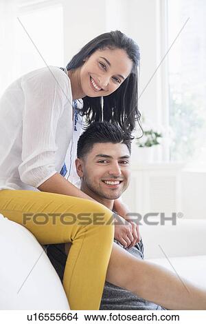 Portrait of happy, young couple View Large Photo Image Picture - Portrait of happy, young couple. Fotosearch
