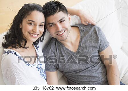 Portrait of happy young couple View Large Photo Image Stock Image - Portrait of happy young couple. Fotosearch