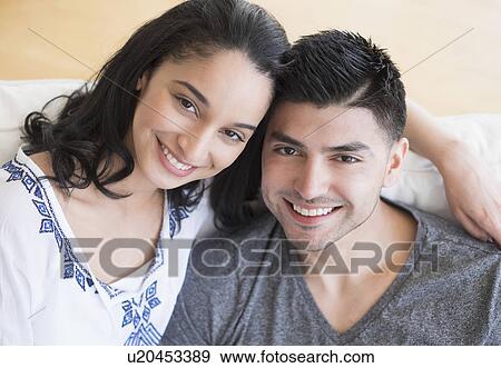 Portrait of happy young couple View Large Photo Image Stock Photo - Portrait of happy young couple. Fotosearch
