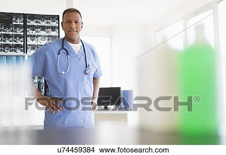 Picture - Portrait of male doctor in hospital. Fotosearch