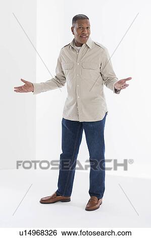 Stock Photograph - Portrait of mature man, studio shot. Fotosearch