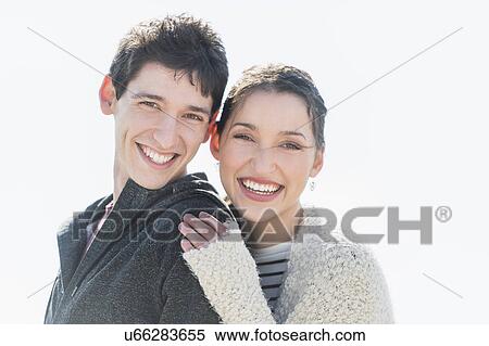 Stock Photography - Portrait of young couple. Fotosearch