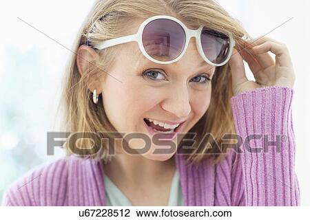 Portrait of young woman View Large Photo Image Stock Image - Portrait of young woman. Fotosearch