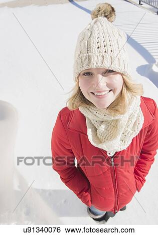 Portrait of young woman wearing knit hat in winter View Large Photo Image Stock Photograph - Portrait of young woman wearing knit hat in winter. Fotosearch