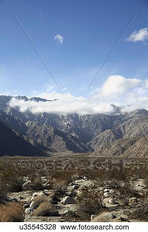 Scenic landscape with mountain range View Large Photo Image Stock Photo - Scenic landscape with mountain range. Fotosearch
