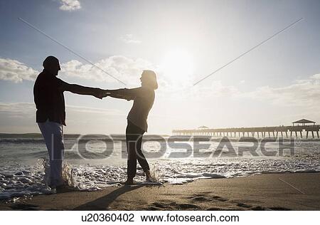 Senior couple dancing on beach View Large Photo Image Stock Image - Senior couple dancing on beach. Fotosearch