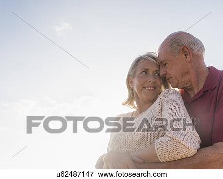 Senior couple embracing View Large Photo Image Stock Photo - Senior couple embracing. Fotosearch